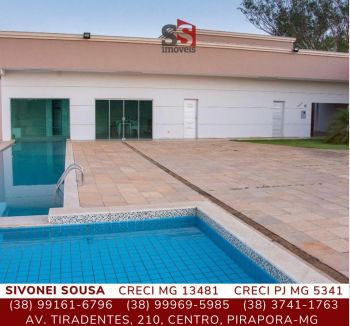 Casa em condomínio em frente ao Rio